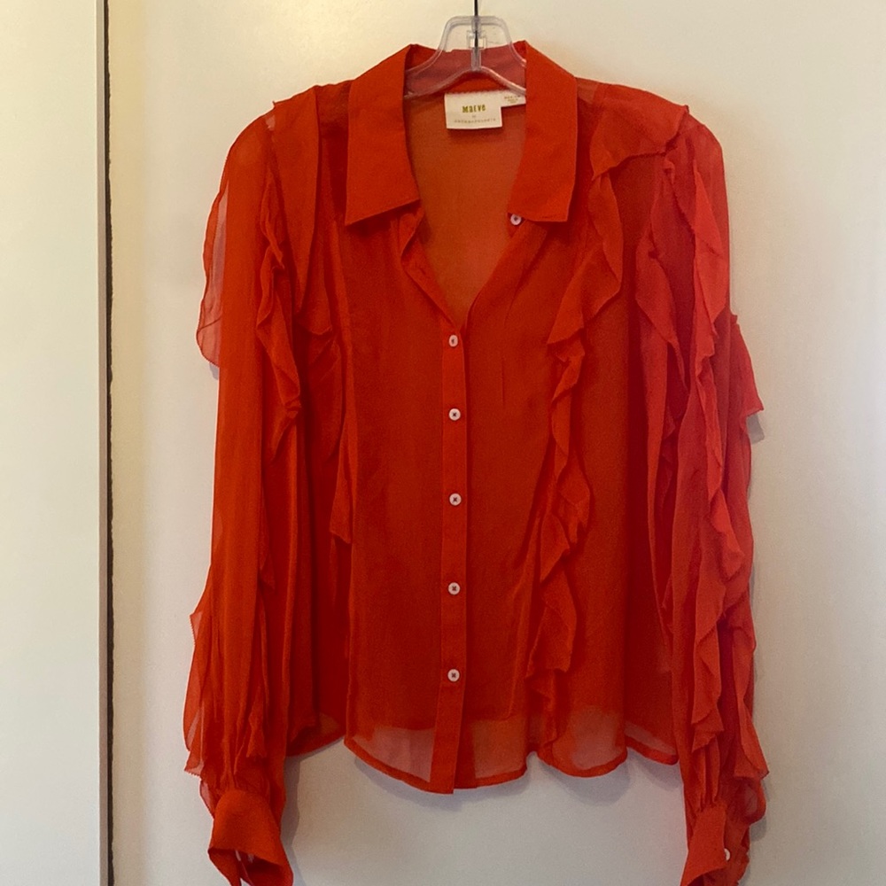 Maeve by Anthropologie sheer orange ruffled blouse.